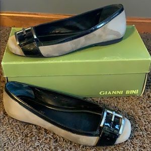 Gray suede flats with buckle.